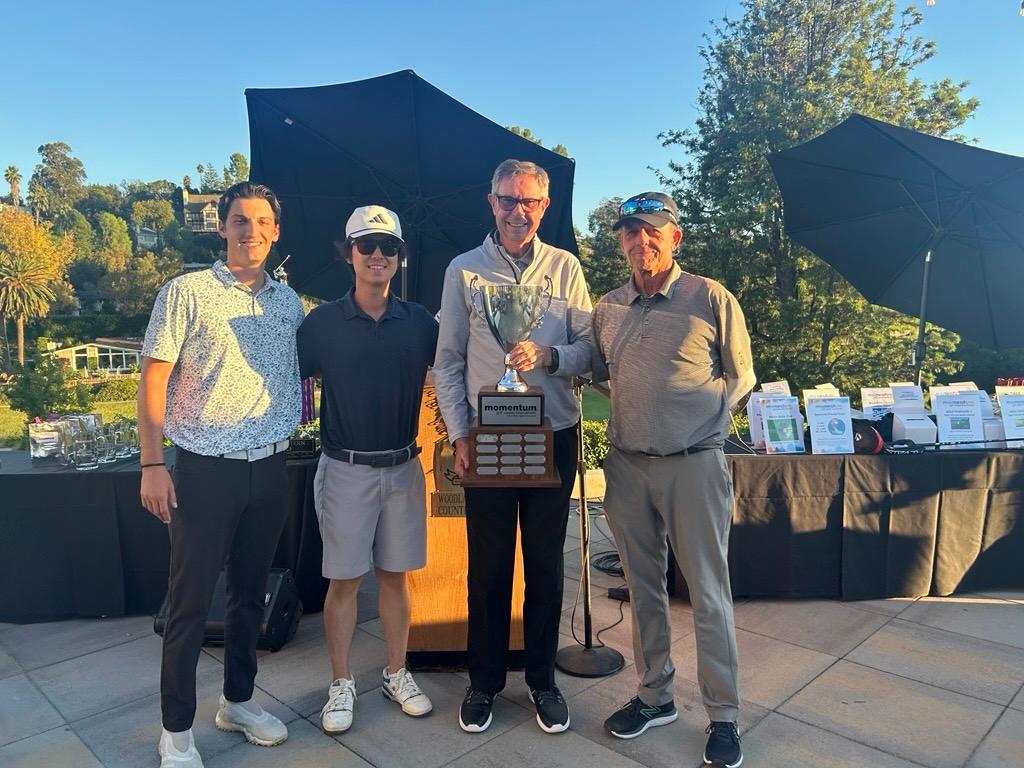 Golf Tournament Winners Pose for Picture